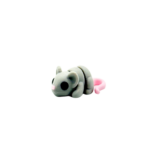 Lightweight mini fidget with soft colours and quiet articulation
