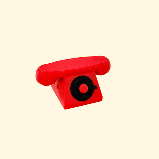 retro phone clicker fidget toy designed for sensory input and collecting
