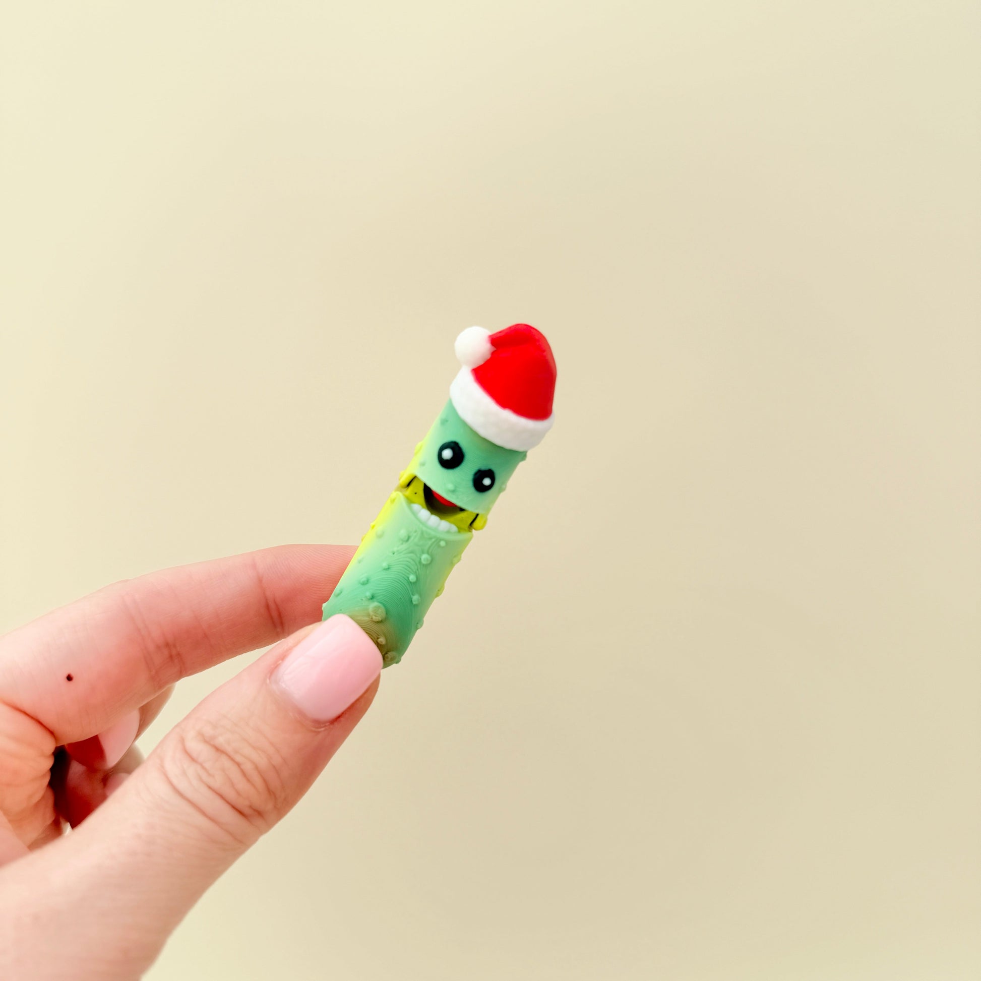 Small hand-friendly fidget with light texture for thumb tracing.
