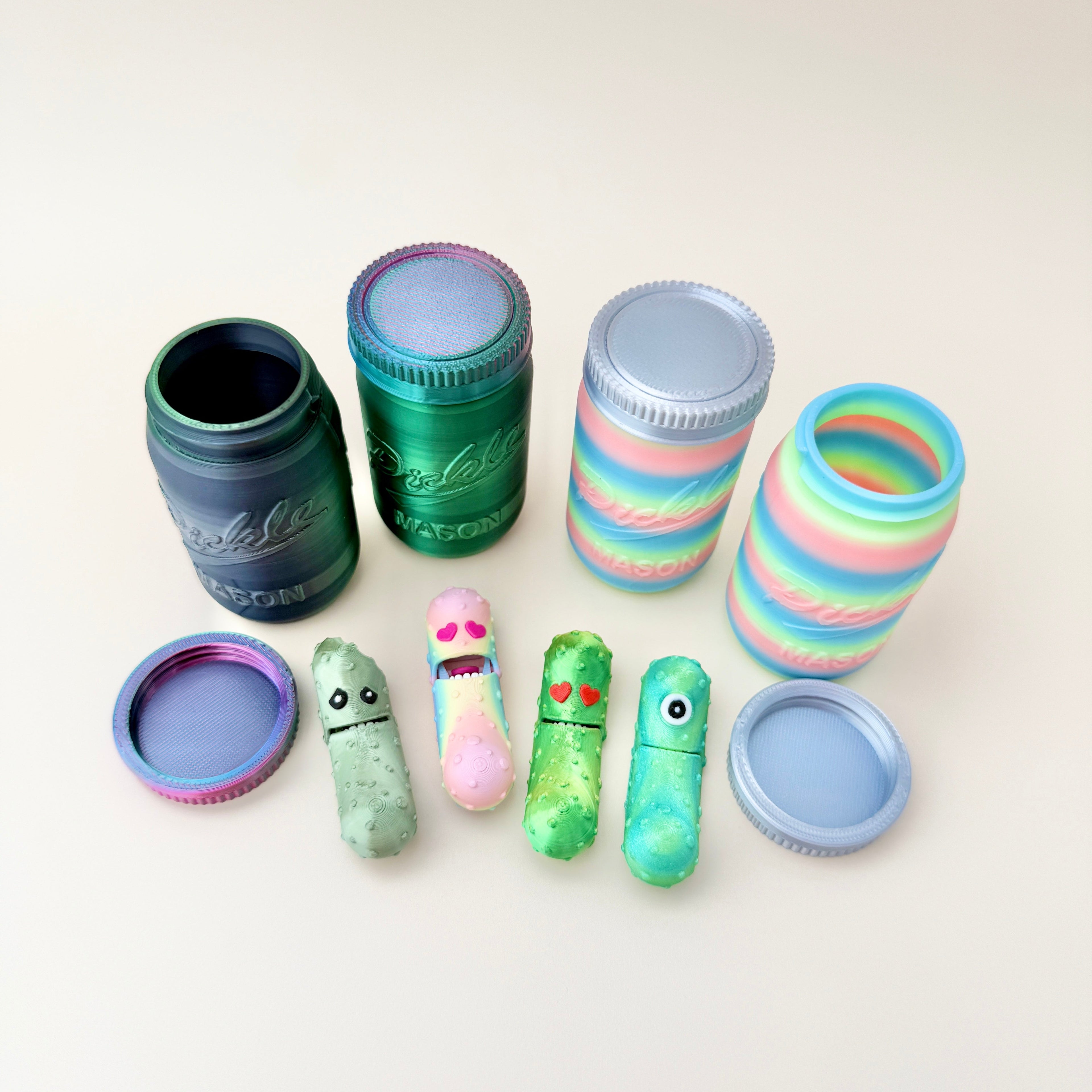 Colour-changing mason jar in green and black with two quirky fidget pickles.