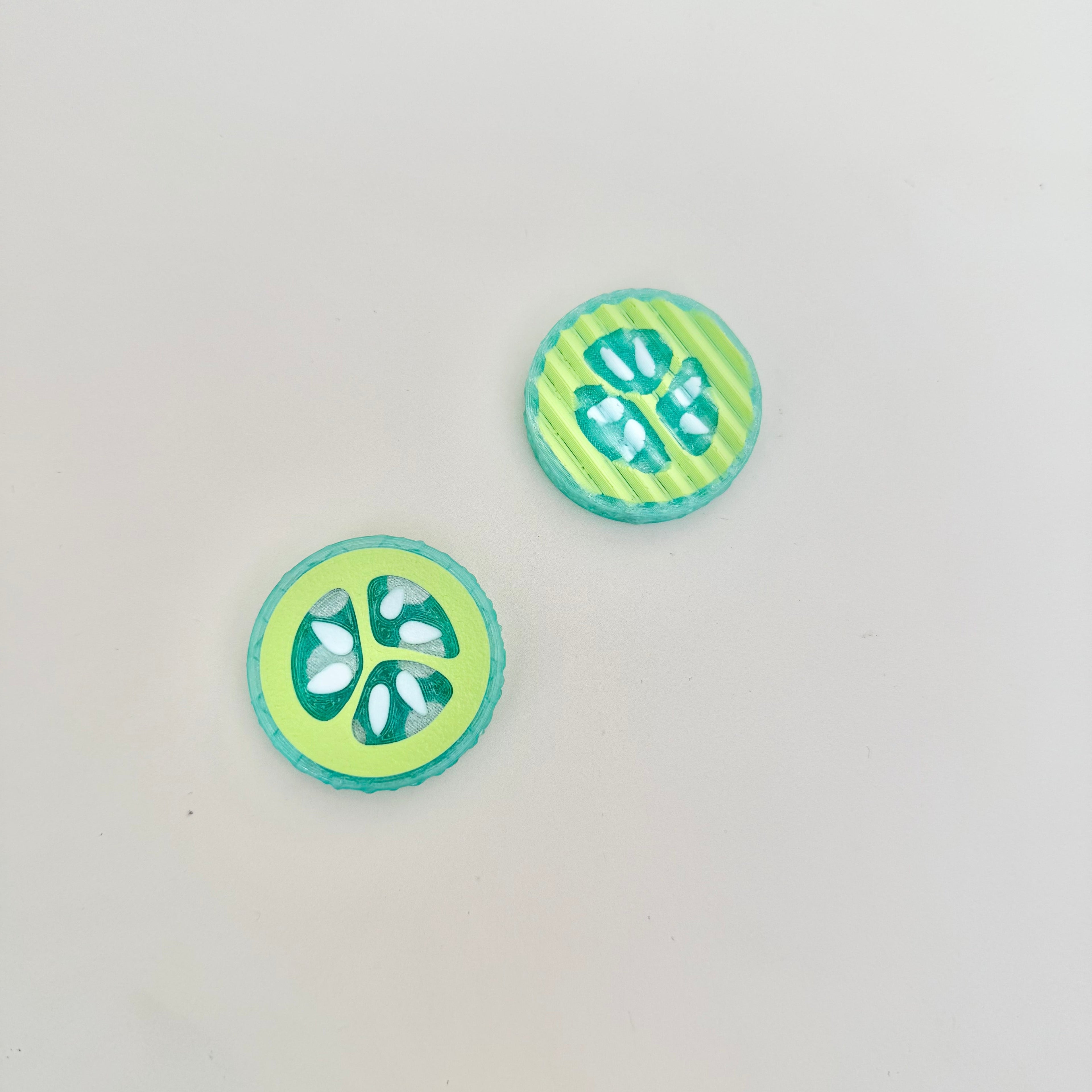 Compact magnetic pickle fidget designed for resistance, pressure and tactile stimming.
