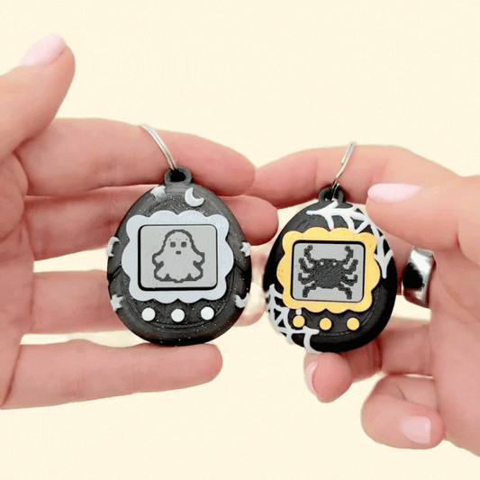 handheld retro-inspired sensory clicker with keyring loop
