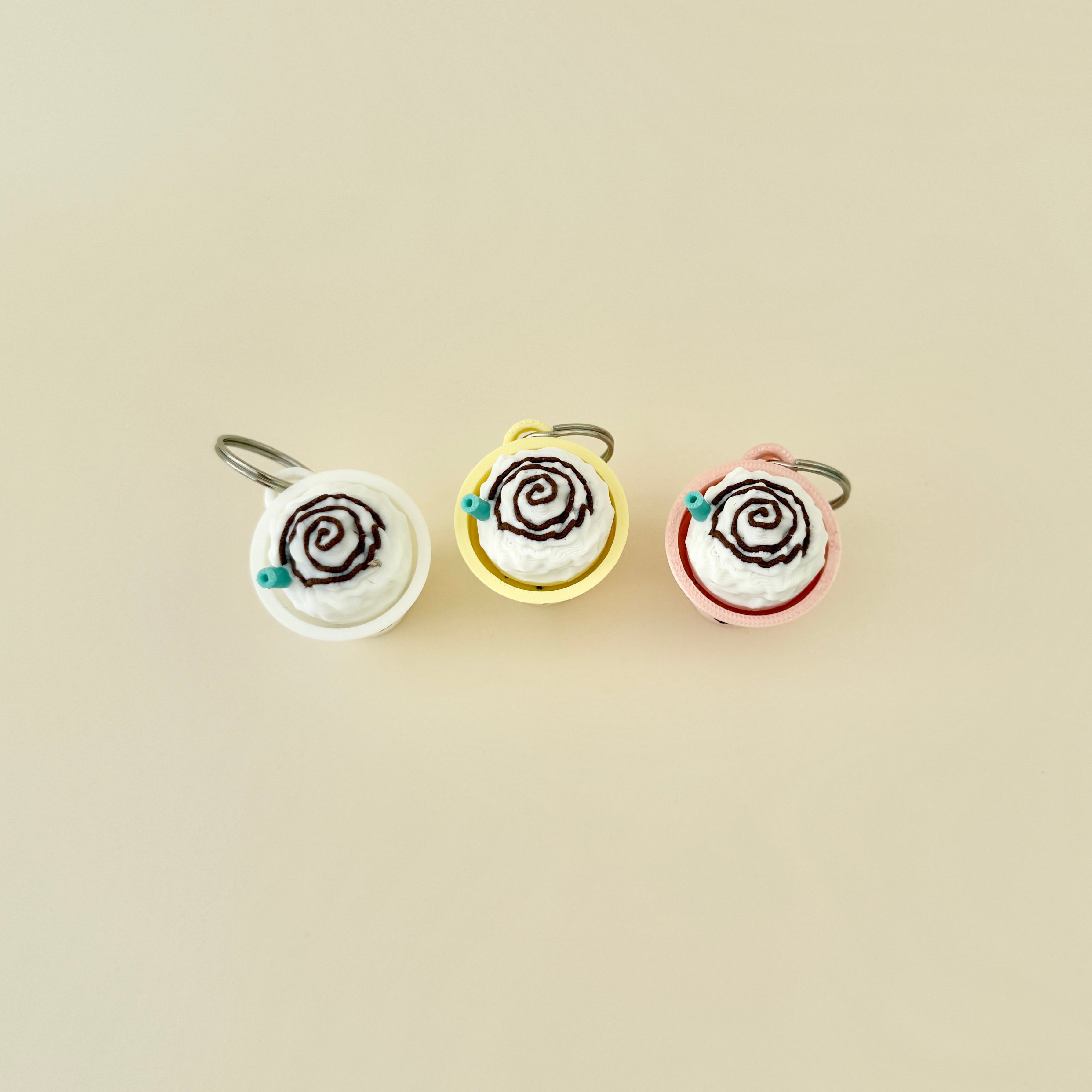 A small, Starbucks-inspired fidget toy with a fun clicking feature for stress relief.