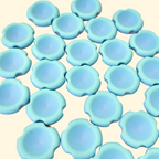 A small, round thumb fidget toy with a smooth centre and ridged edge, designed for sensory input and calming play.