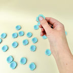 Small handheld fidget toy showing size in palm, suitable for discreet sensory use.