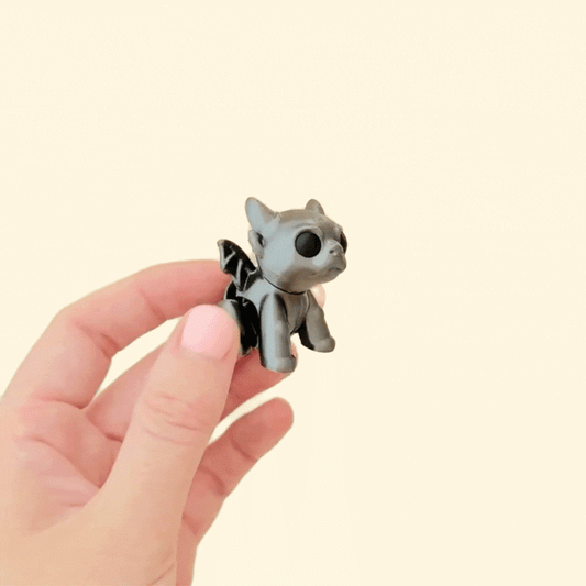 compact gargoyle figure designed for quiet stimming and display

