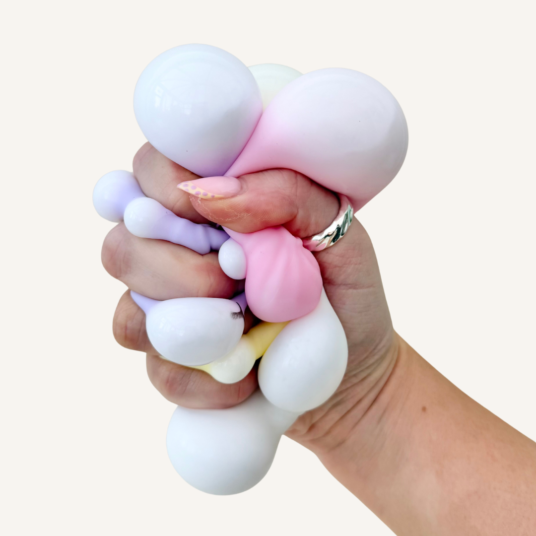 Compact squishy sensory fidget set designed for travel and everyday carry, offering quiet tactile comfort for busy hands.
