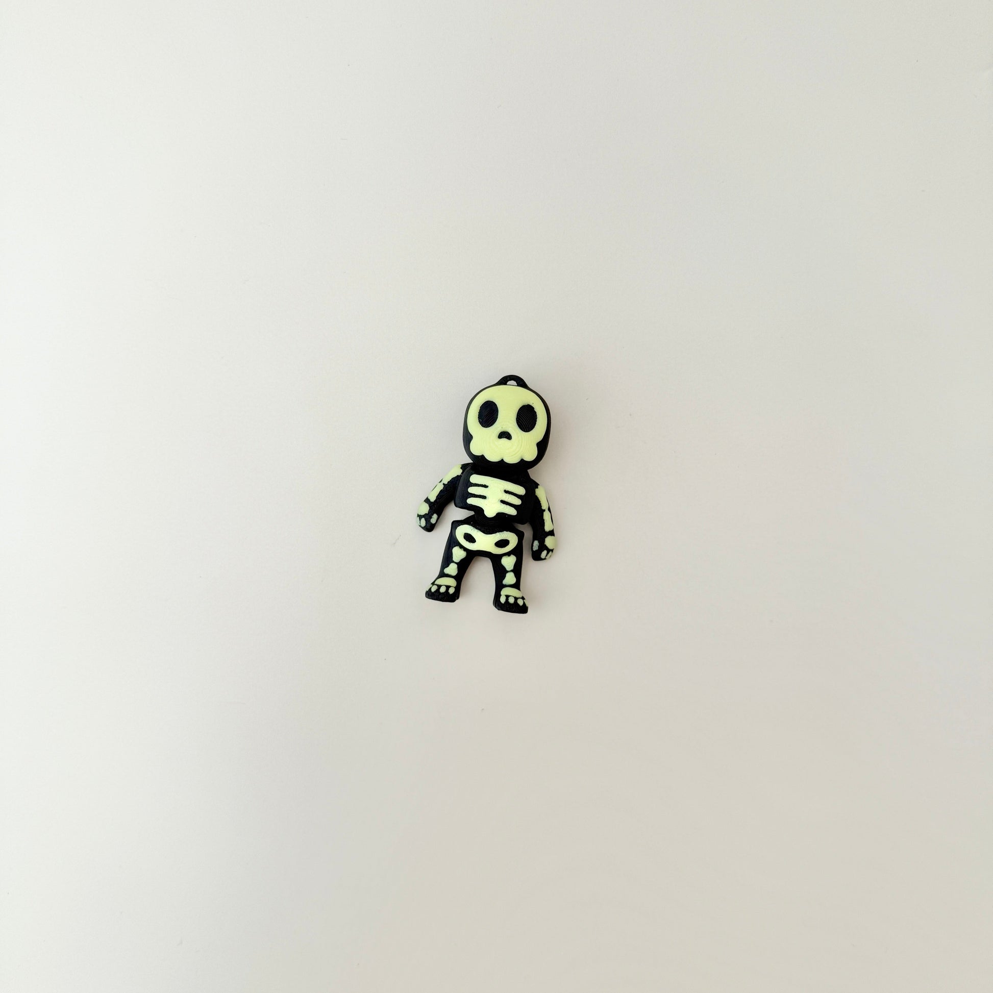 mini skeleton charm with raised bone texture for tactile stimming
