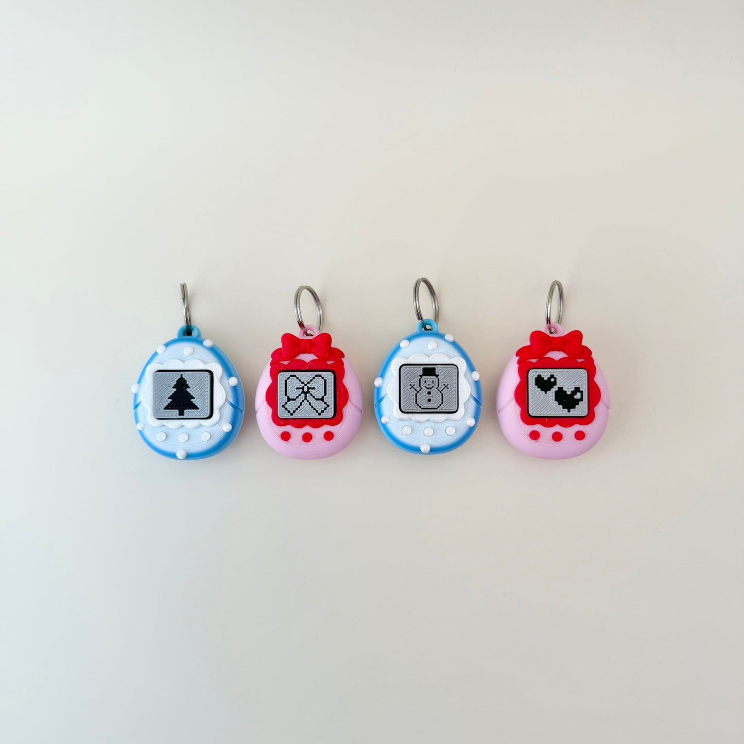 Compact clickable screen fidget with smooth press action, sturdy split ring and rounded shell; discreet stim tool.
