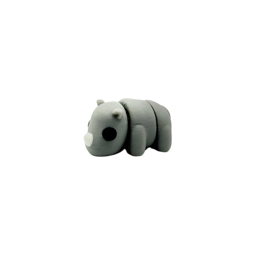 Tiny handheld sensory fidget with quiet articulated motion for regulation

