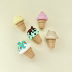 Small fidget toy designed like an ice cream cone with clicker function and optional upgrades.