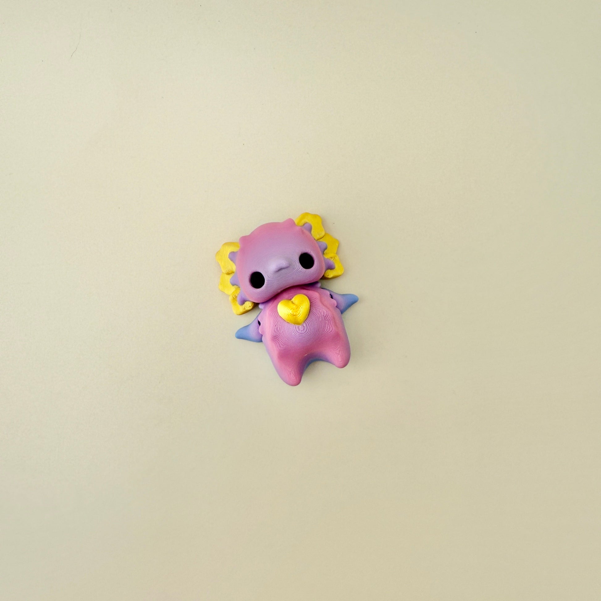 A whimsical fidget toy with intricate details, great for on-the-go fidgeting and relaxation.