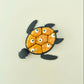 halloween sensory clicker with textured bubble top and eyeball details
