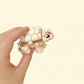 textured articulated sensory fidget designed for tactile stimming and desk play
