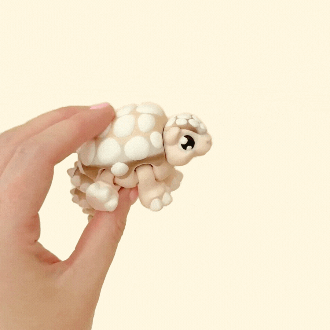 textured articulated sensory fidget designed for tactile stimming and desk play

