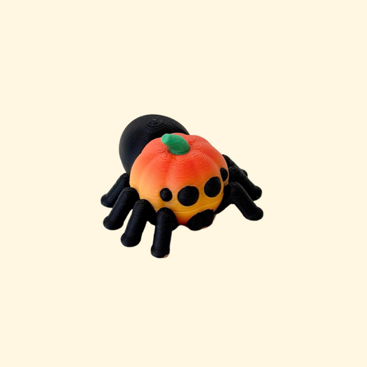 small hybrid pumpkin spider sensory toy with textured surfaces for quiet stimming
