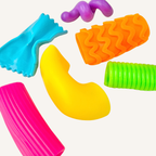Low-noise textured fidget set designed for subtle hand movement, tracing and everyday sensory support.
