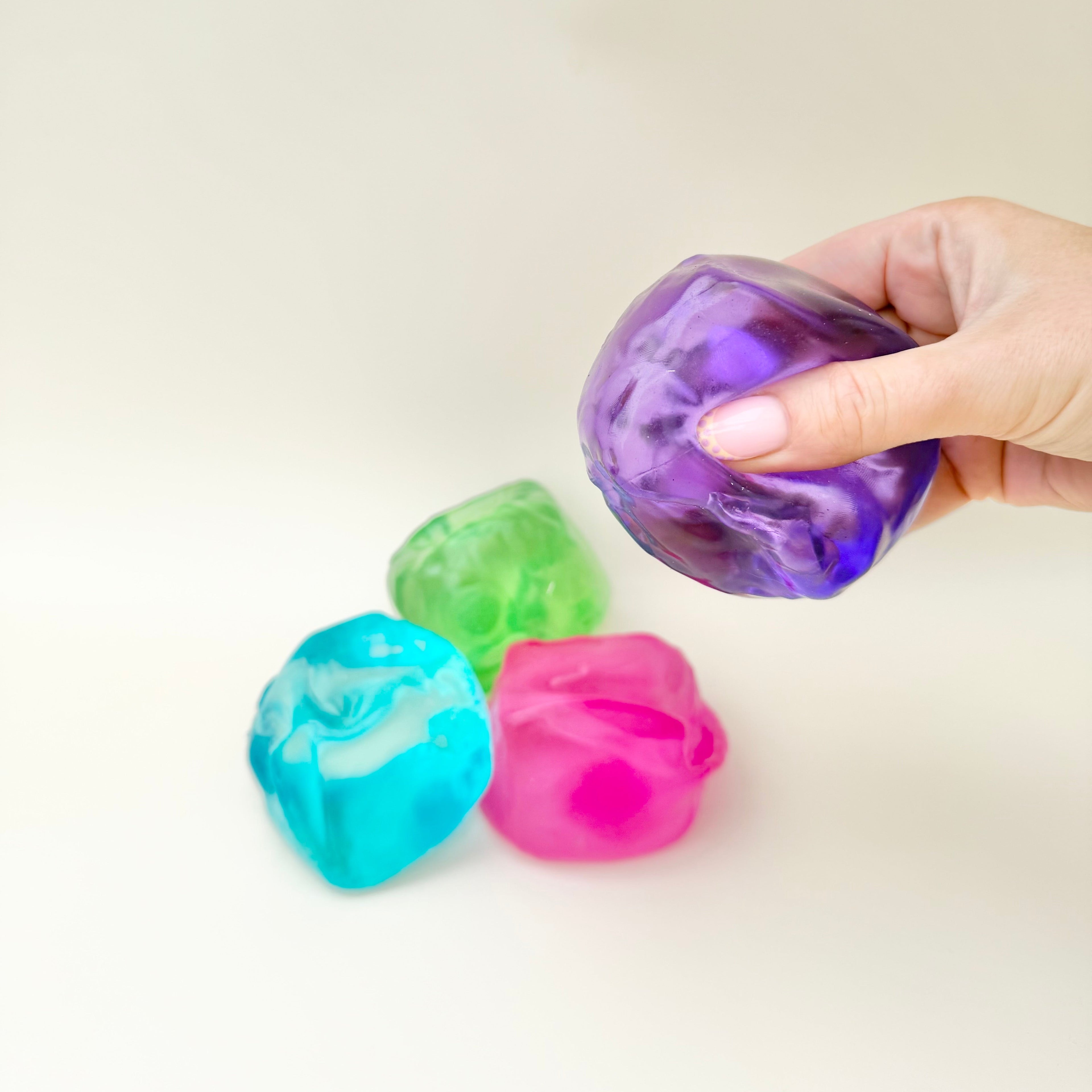 Low-noise squishy fidget toy with soft gel feel for calming squeezes, grounding and everyday sensory support.