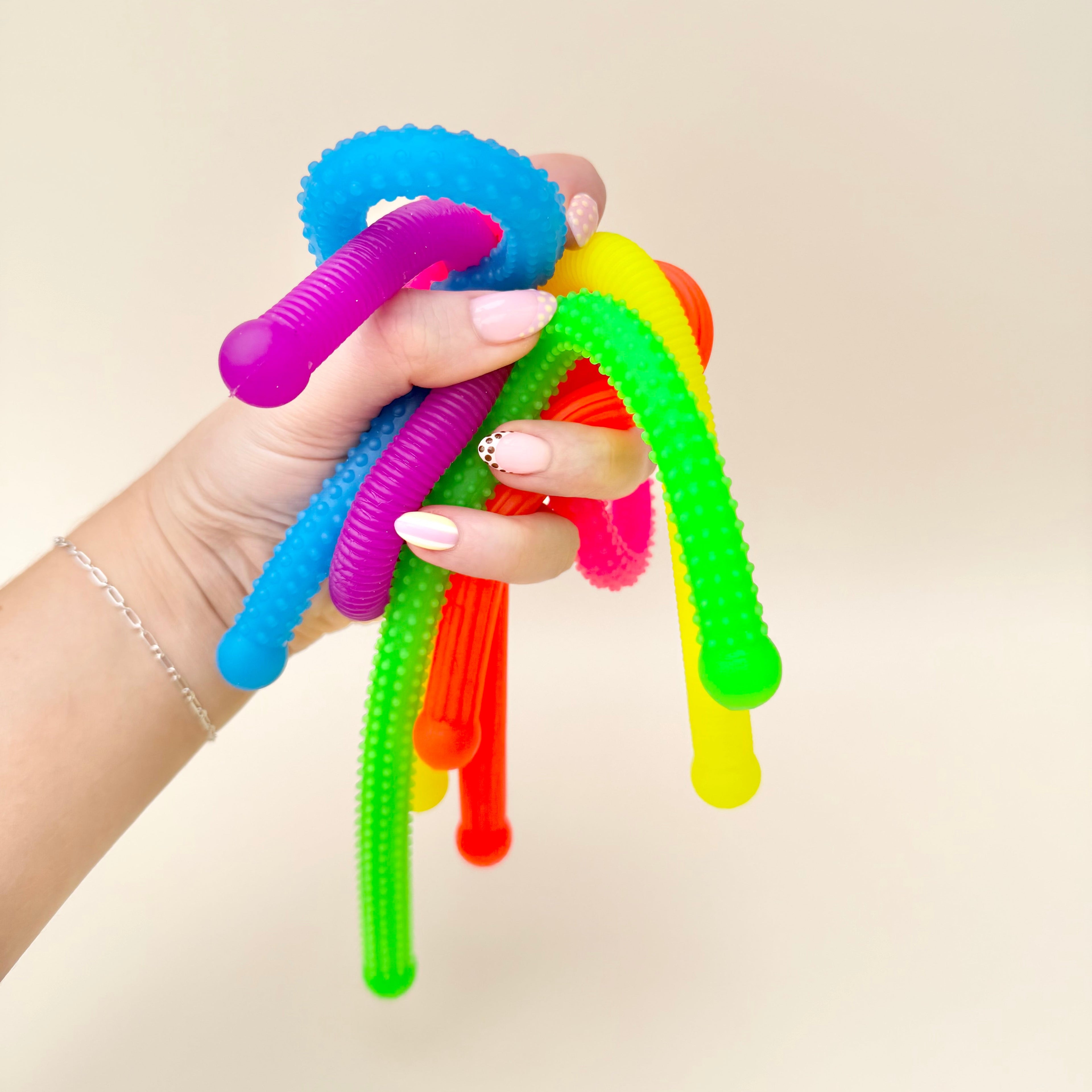 Low-noise stretchy fidget set with mixed textures for travel, desk use and everyday sensory regulation support.
