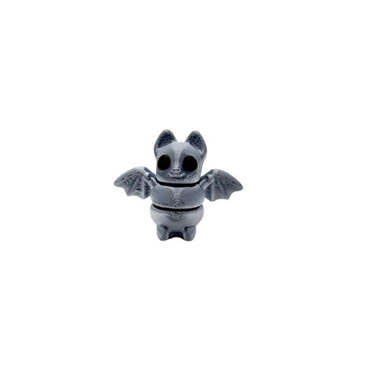 Tiny hand fidget with low-noise wiggle for sensory regulation
