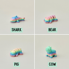 Cute mini rainbow fidget pet, fully flexible, great for collecting and sensory play.