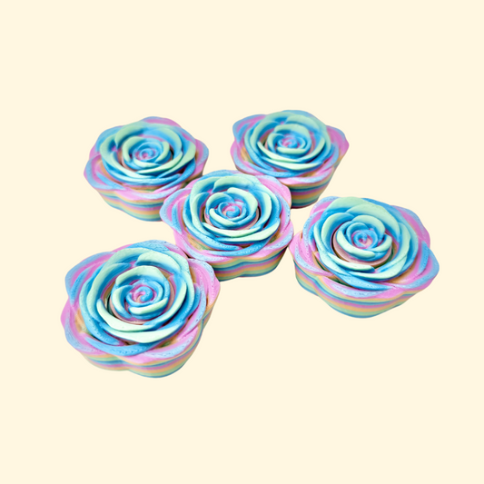 A rose-shaped fidget spinner finished in shimmering rainbow filament.