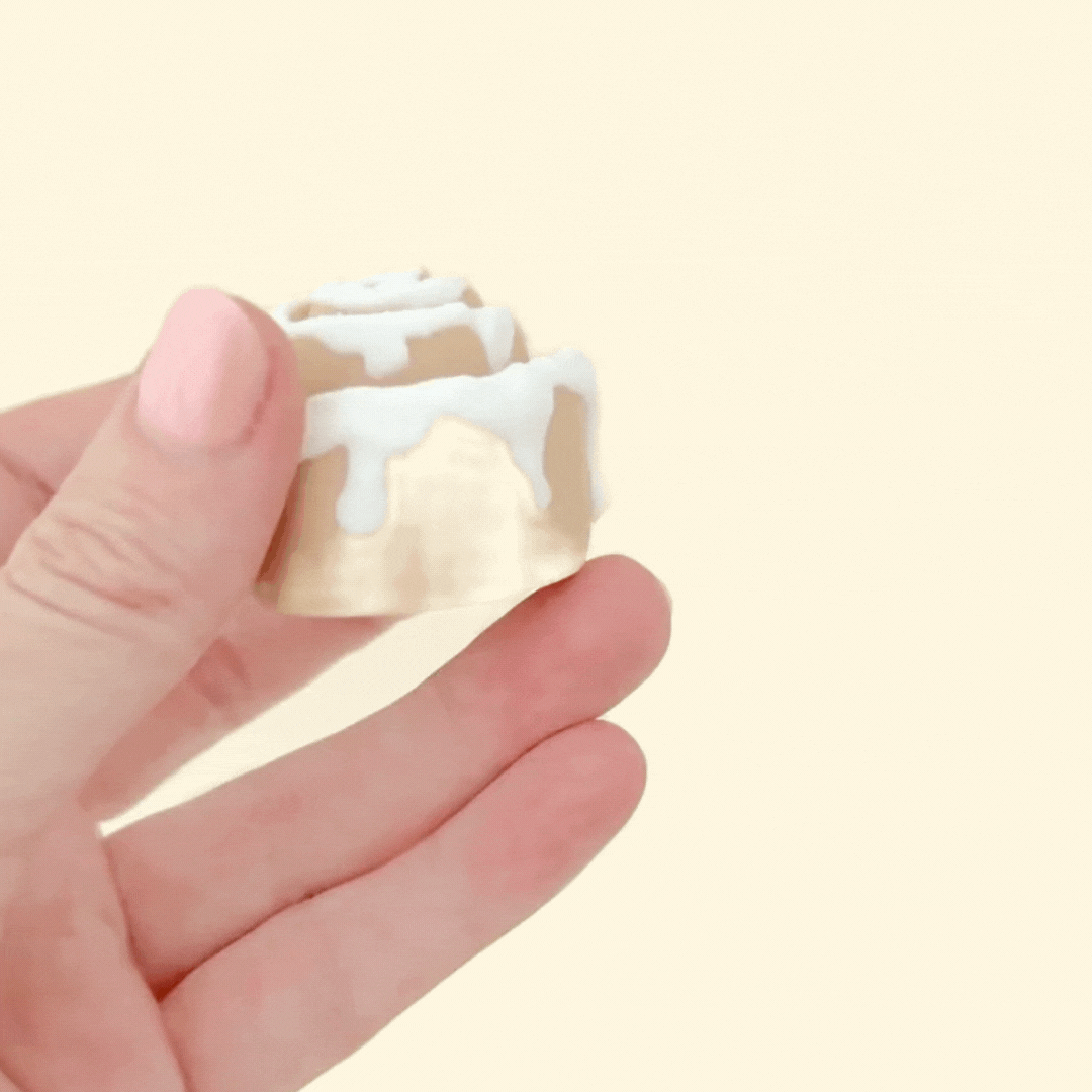 Textured fidget toy resembling a cinnamon roll.