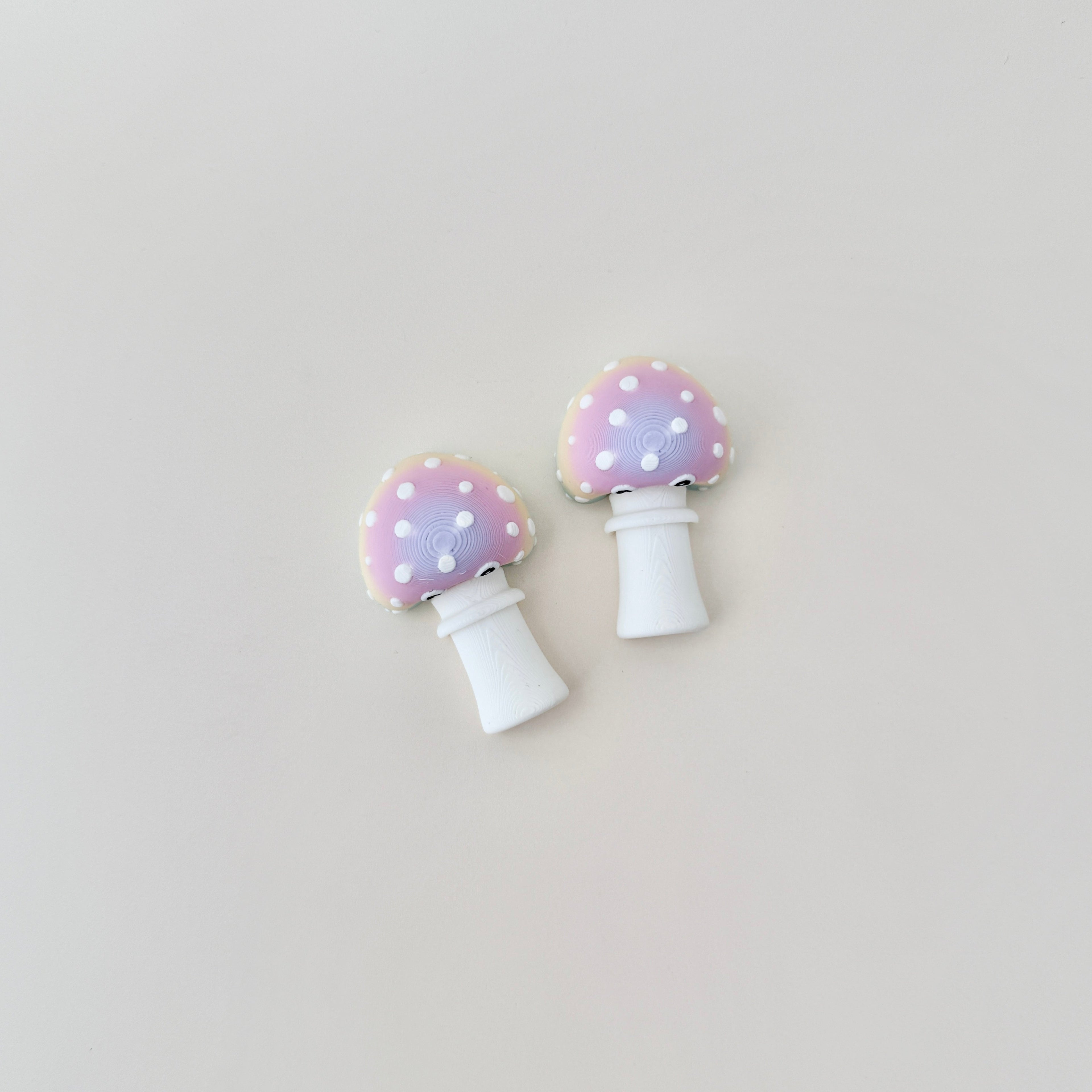 Two colour options, featuring white dot details and a playful design.