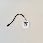 Compact and versatile NFC keyring ideal for supporting individuals with memory loss.
