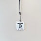 Keyring with integrated NFC functionality for quick access to personalised information.