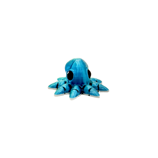 Tiny 3D-printed fidget with articulated movement and tactile feedback
