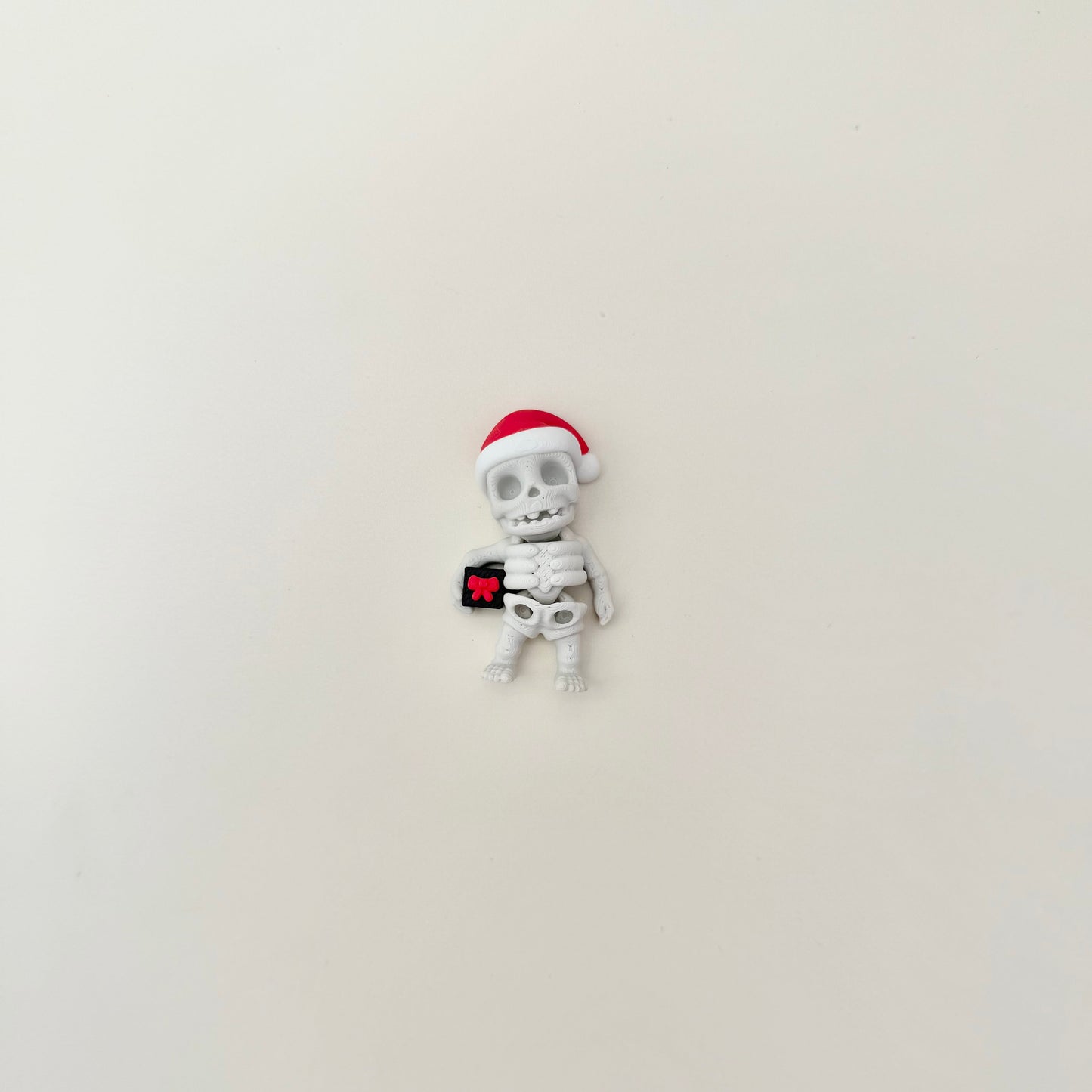 Mini articulated character for sensory seekers and toy collectors.