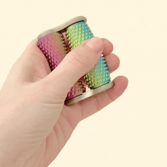 A colour-changing, dual-roller fidget toy with deep texture for sensory stimulation.