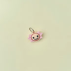 Tactile fidget tool with soft edges and pressable centre.