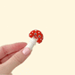 A small, interactive fidget toy with a moving top.