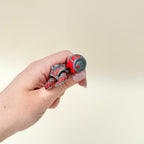 Flexible turtle with textured shell and spooky design.