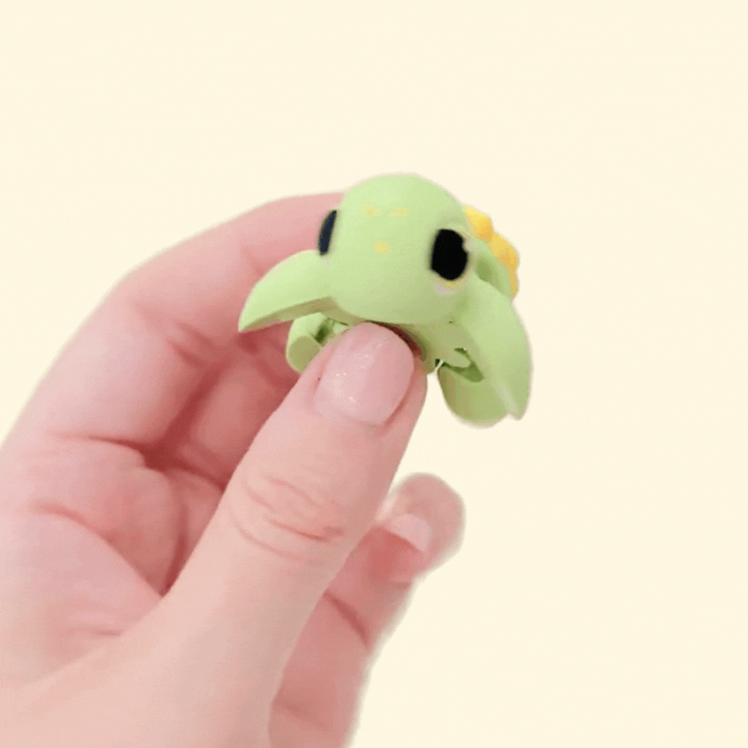 Fidget turtle figure with sunflower shell and movable limbs, great for soothing sensory input.
