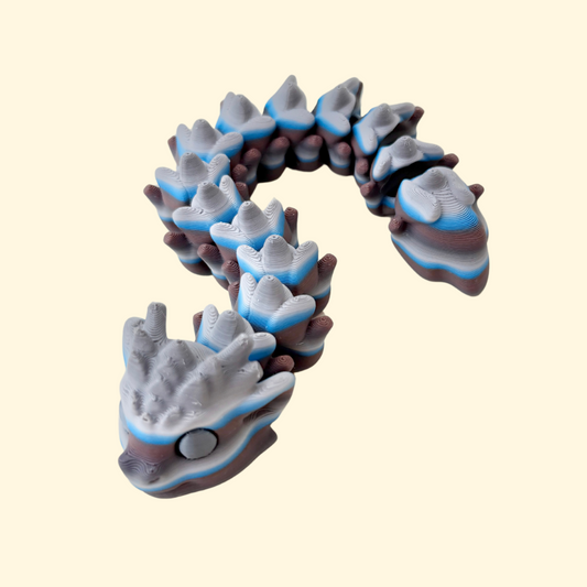 Articulated snake fidget with textured scales and gradient grey-blue finish
