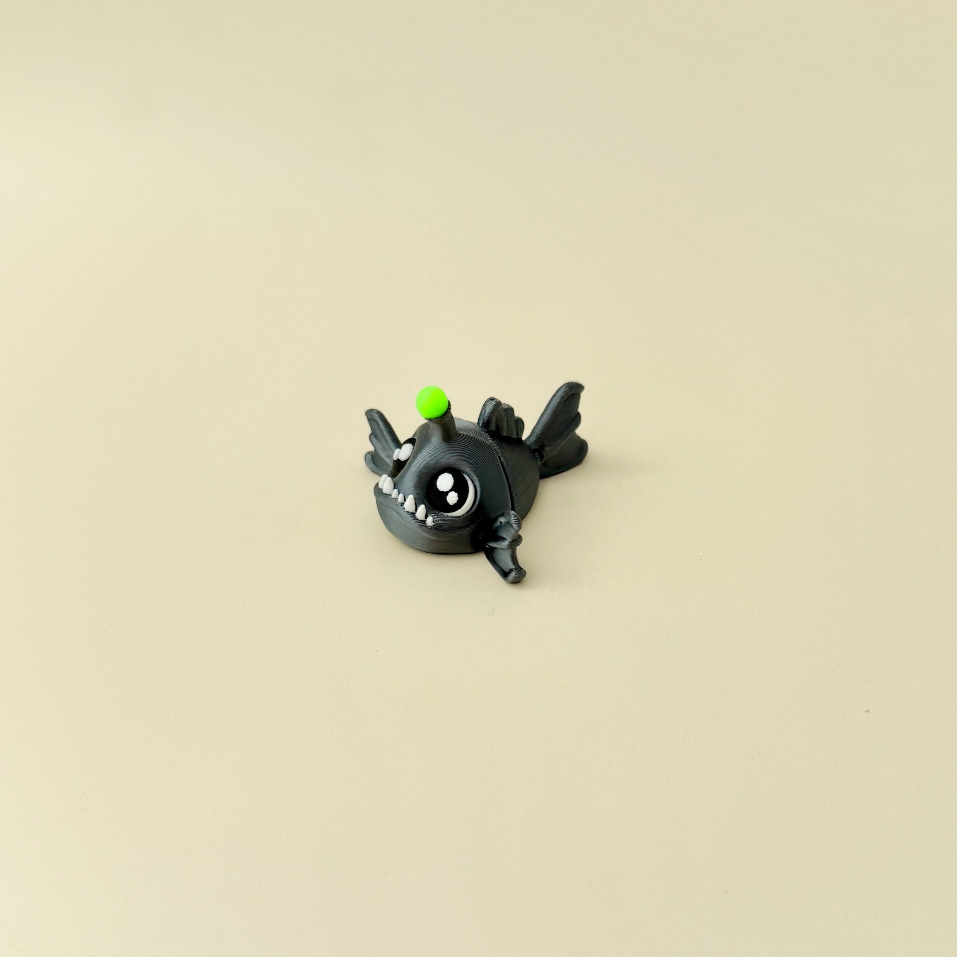Unique underwater-themed fidget toy with a shiny body and tactile movement