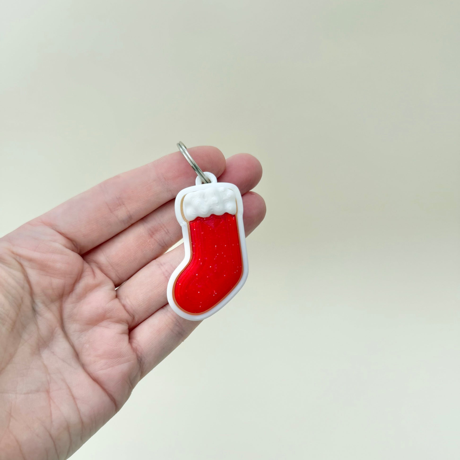 Gloss finish stocking clicker offering audible feedback and gentle vibration on press; upgradeable to quiet click.
