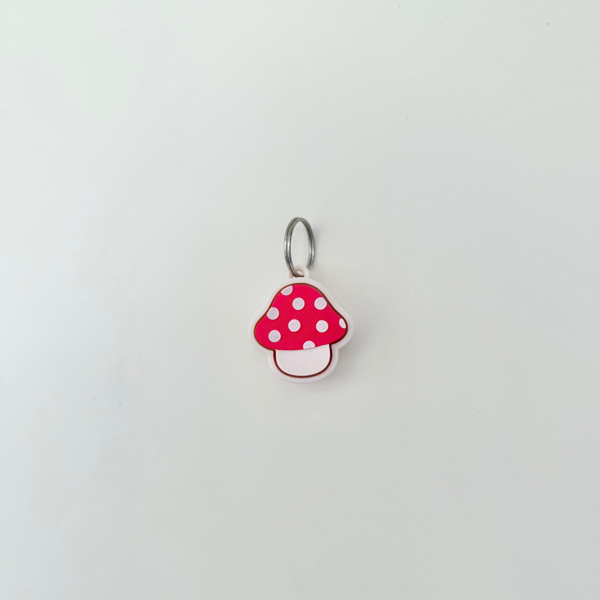 Cute toadstool-themed handheld fidget for everyday sensory use.
