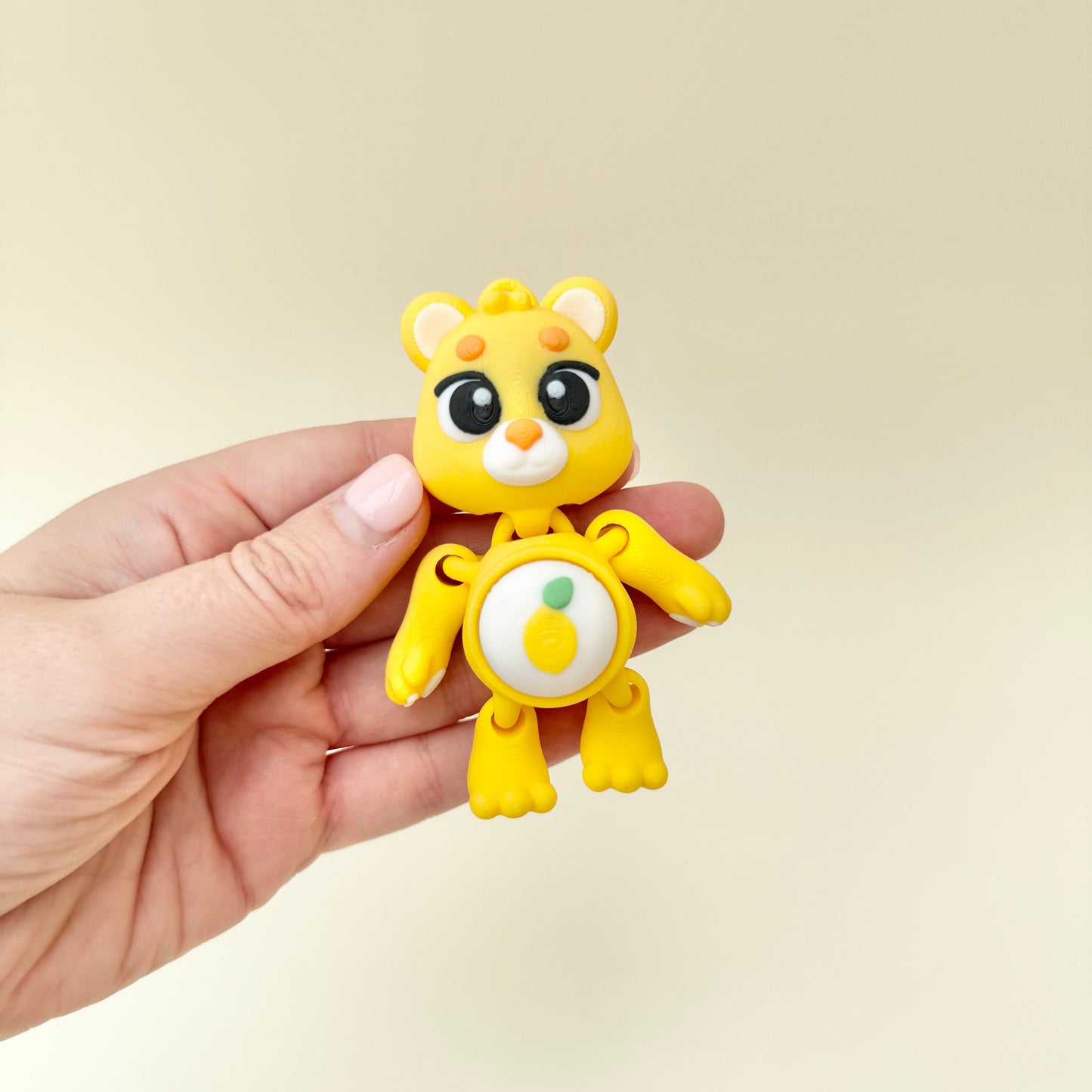 handheld clicker with a single pop action and smooth tactile feel
