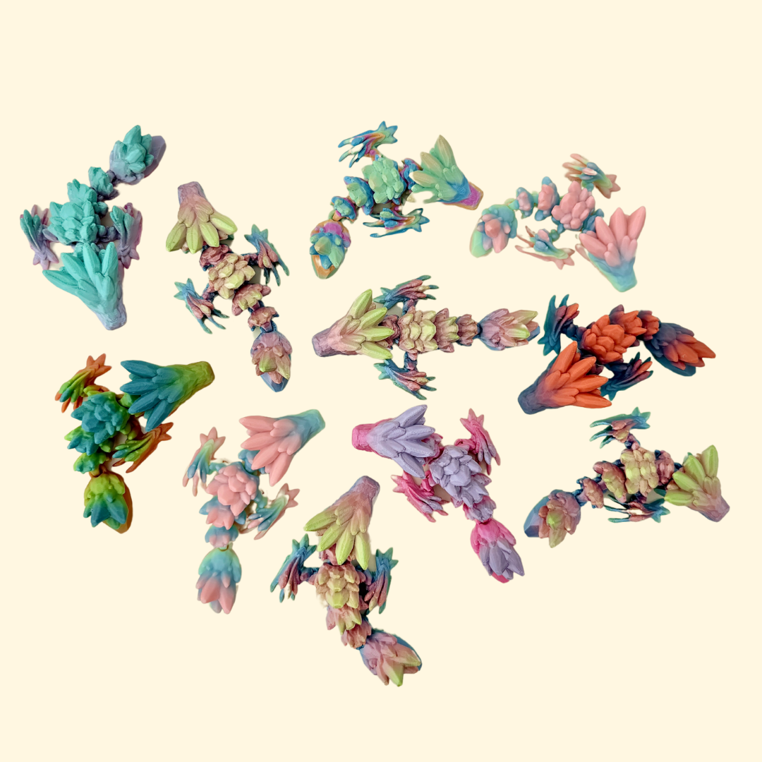 Mini articulated dragon with textured surface and randomised rainbow colouring for sensory play.