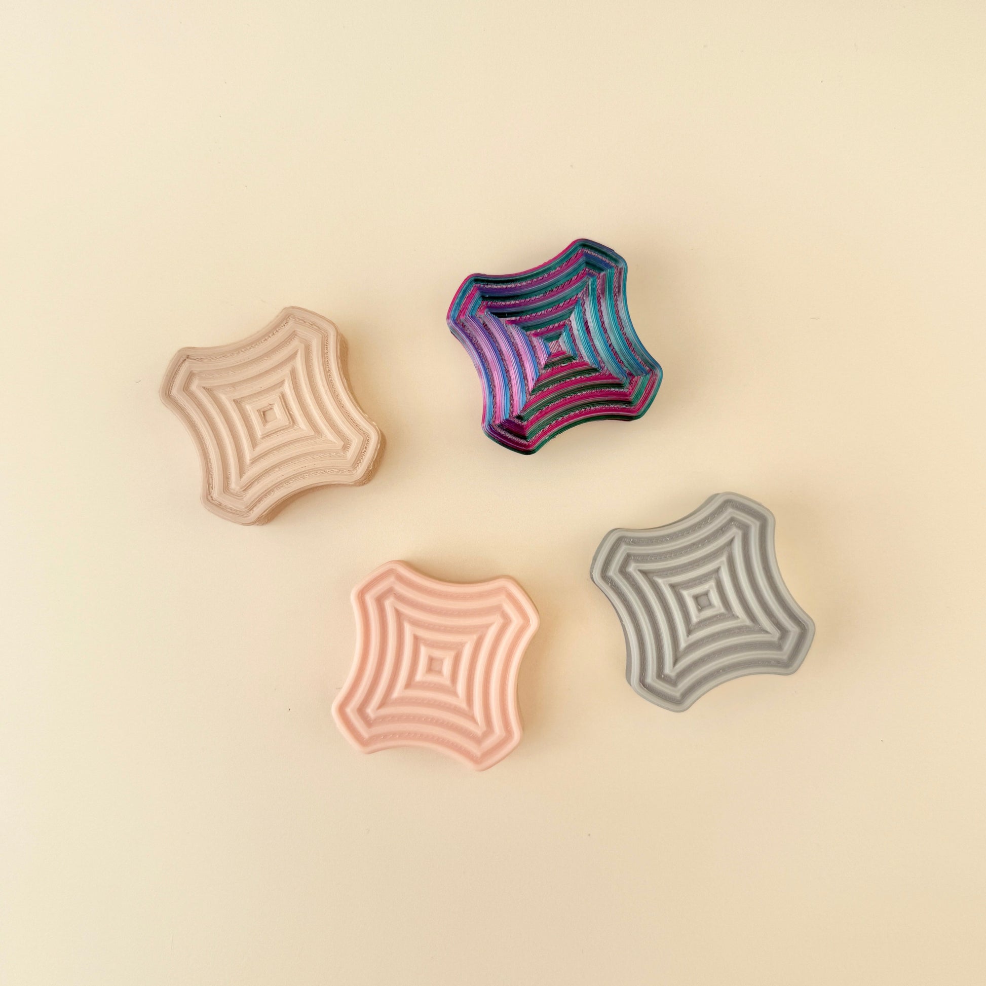 A set of magnetic fidget squares designed for flipping, rolling, and snapping between fingers. A great sensory tool for stress relief and focus.