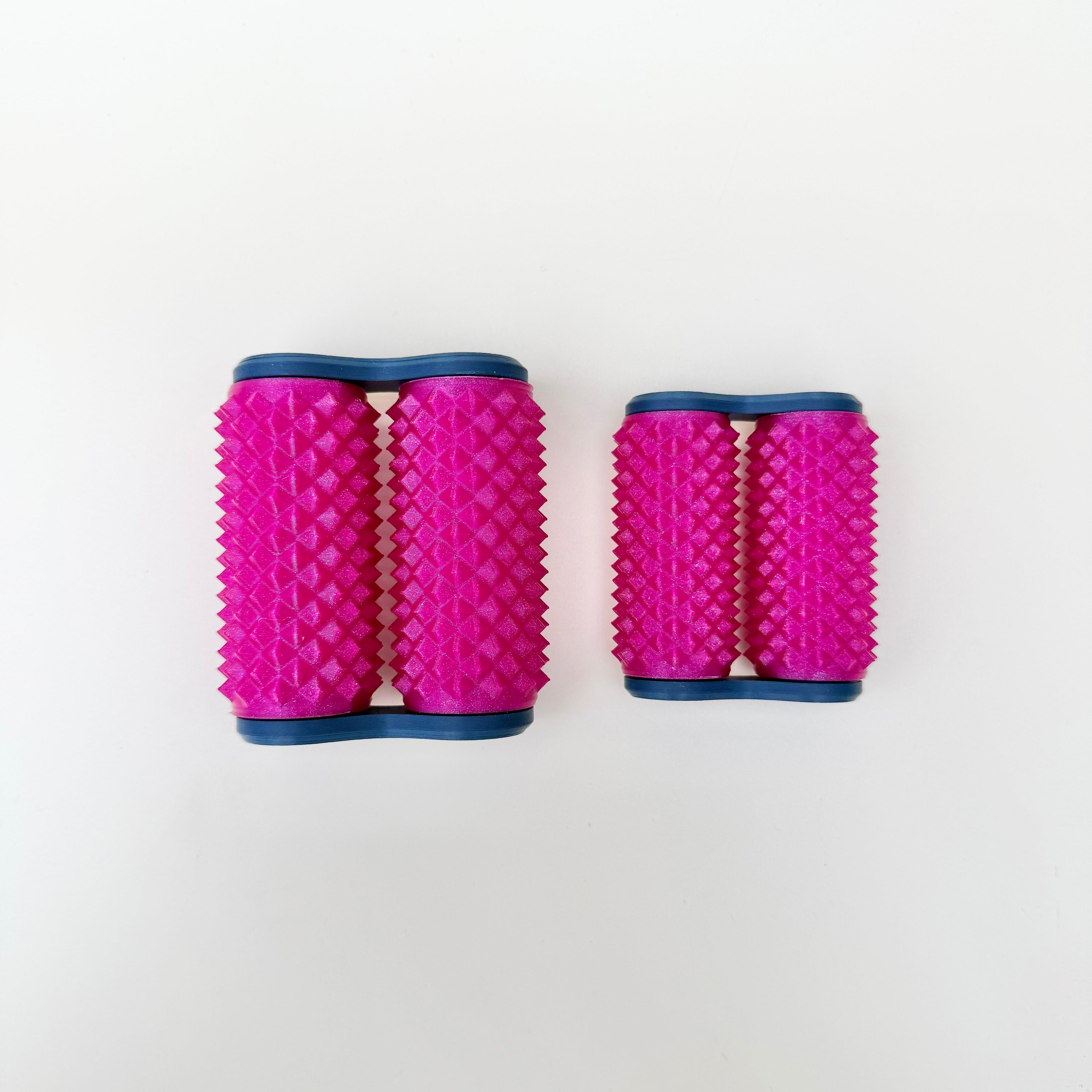 Handheld double roller fidget designed for one-handed rolling, deep pressure input and calming sensory routines
