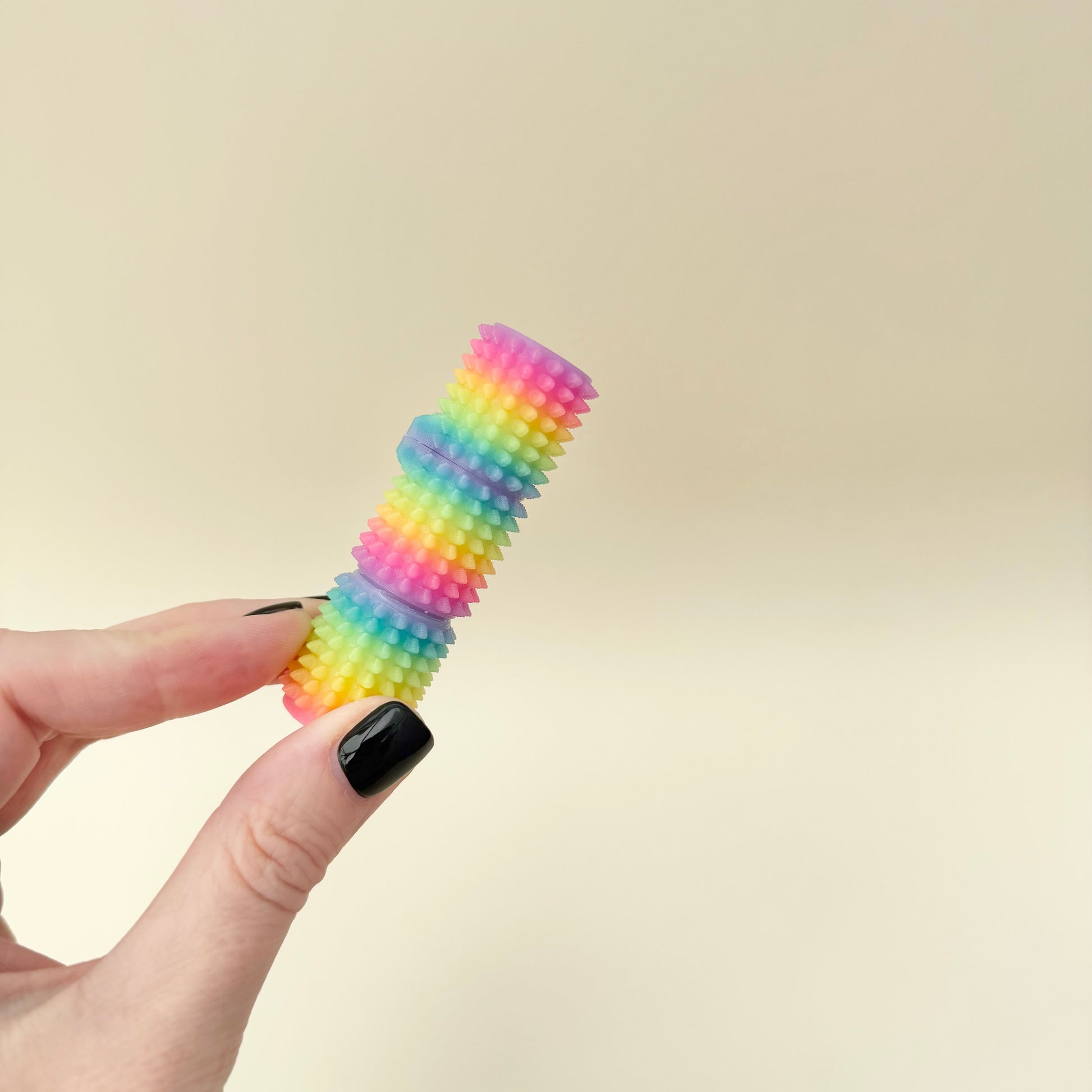 Spiked surface for moderate pain stimming and thumb tracing
