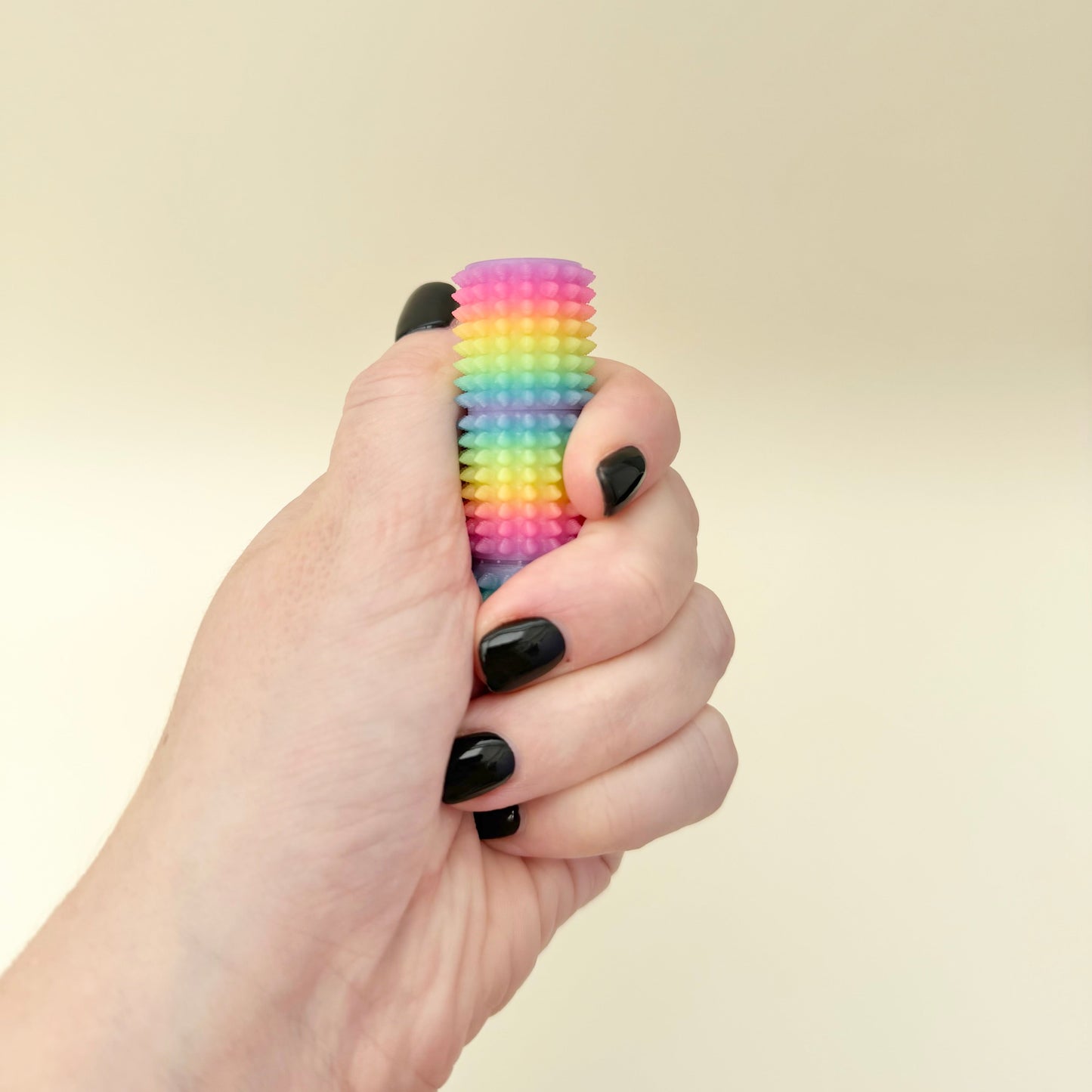 Compact stim bar for on-the-go regulation and habit redirection
