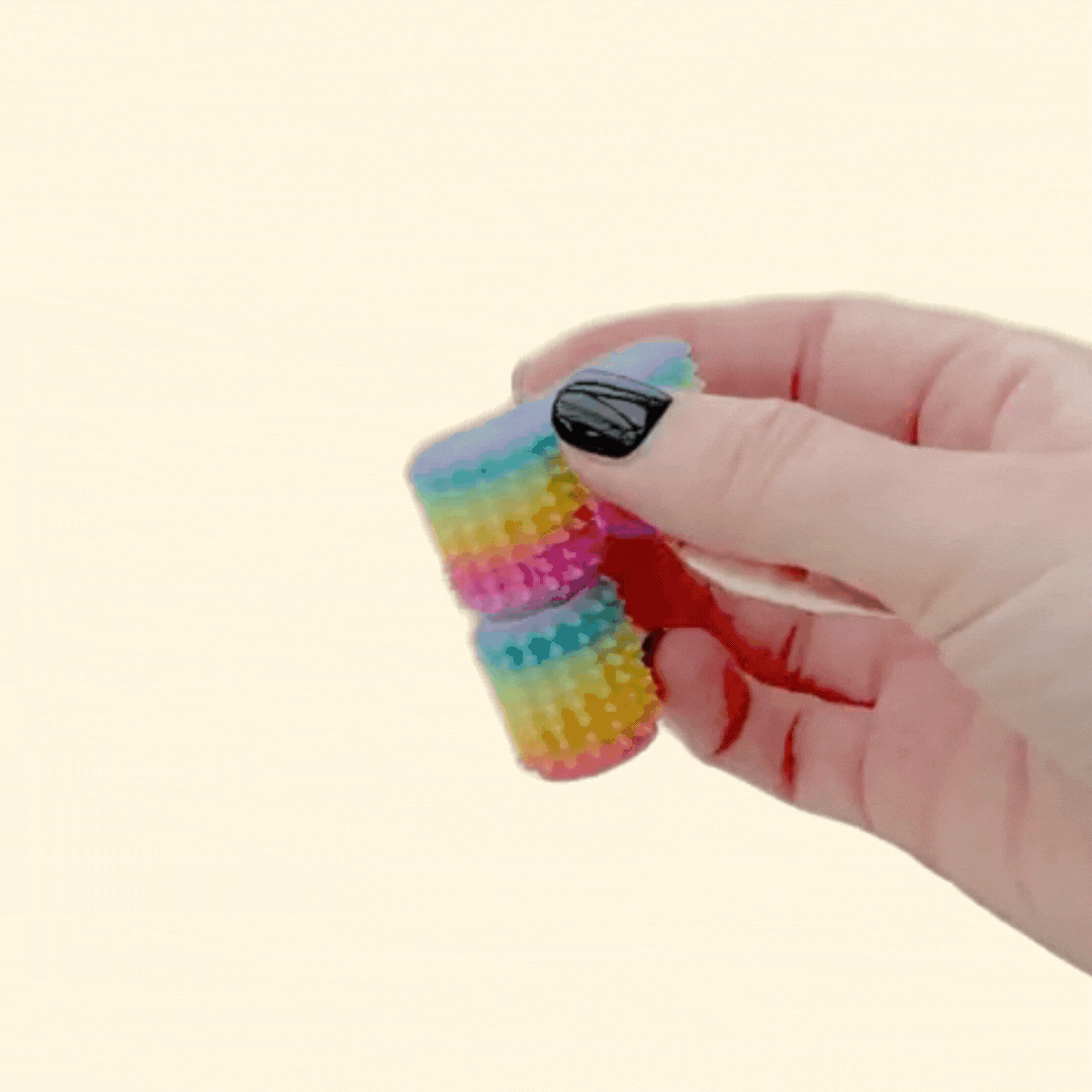 Flip-and-twist stim tool offering repetitive movement and tactile feedback