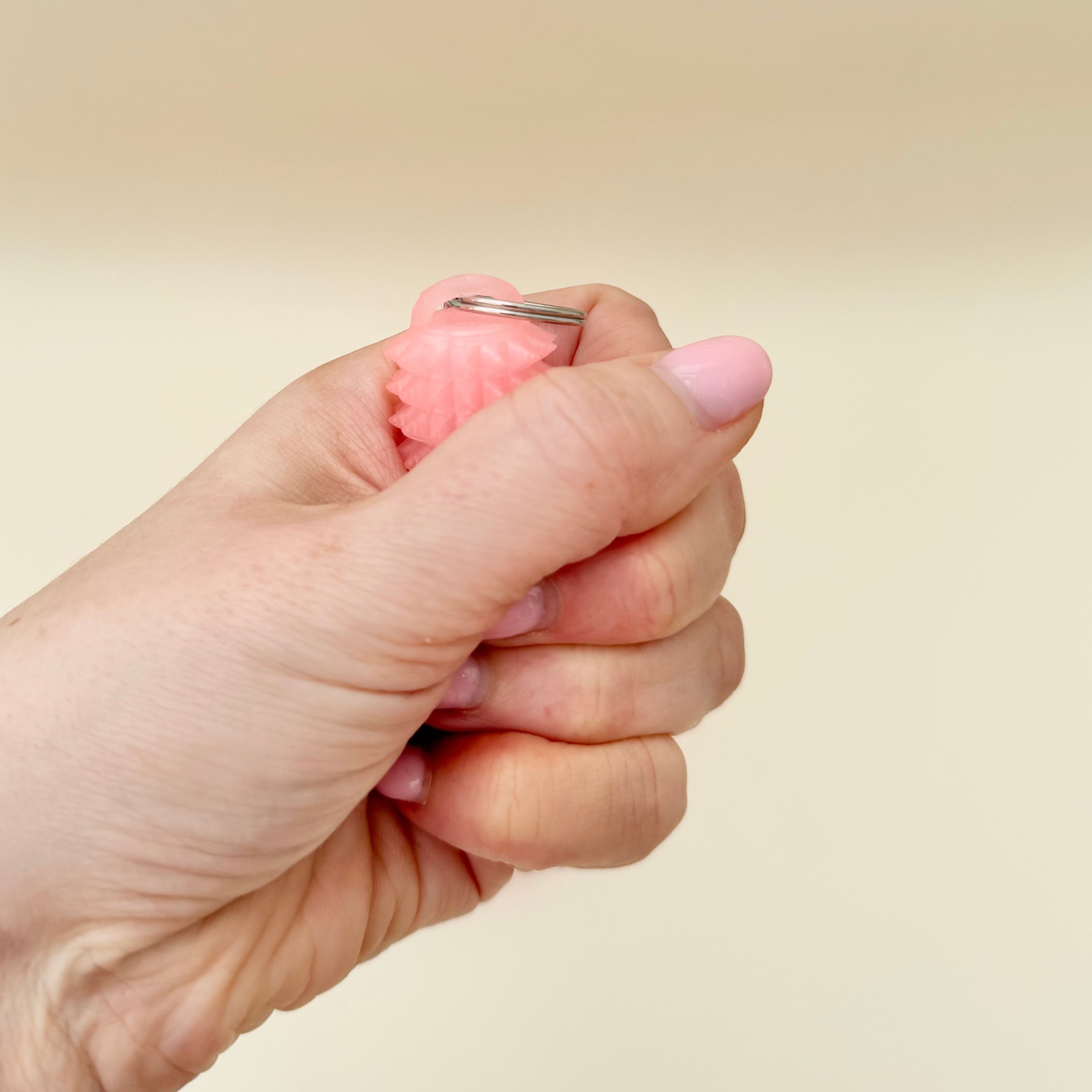 Small high-impact sensory tool suitable for discreet use in hand or pocket.
