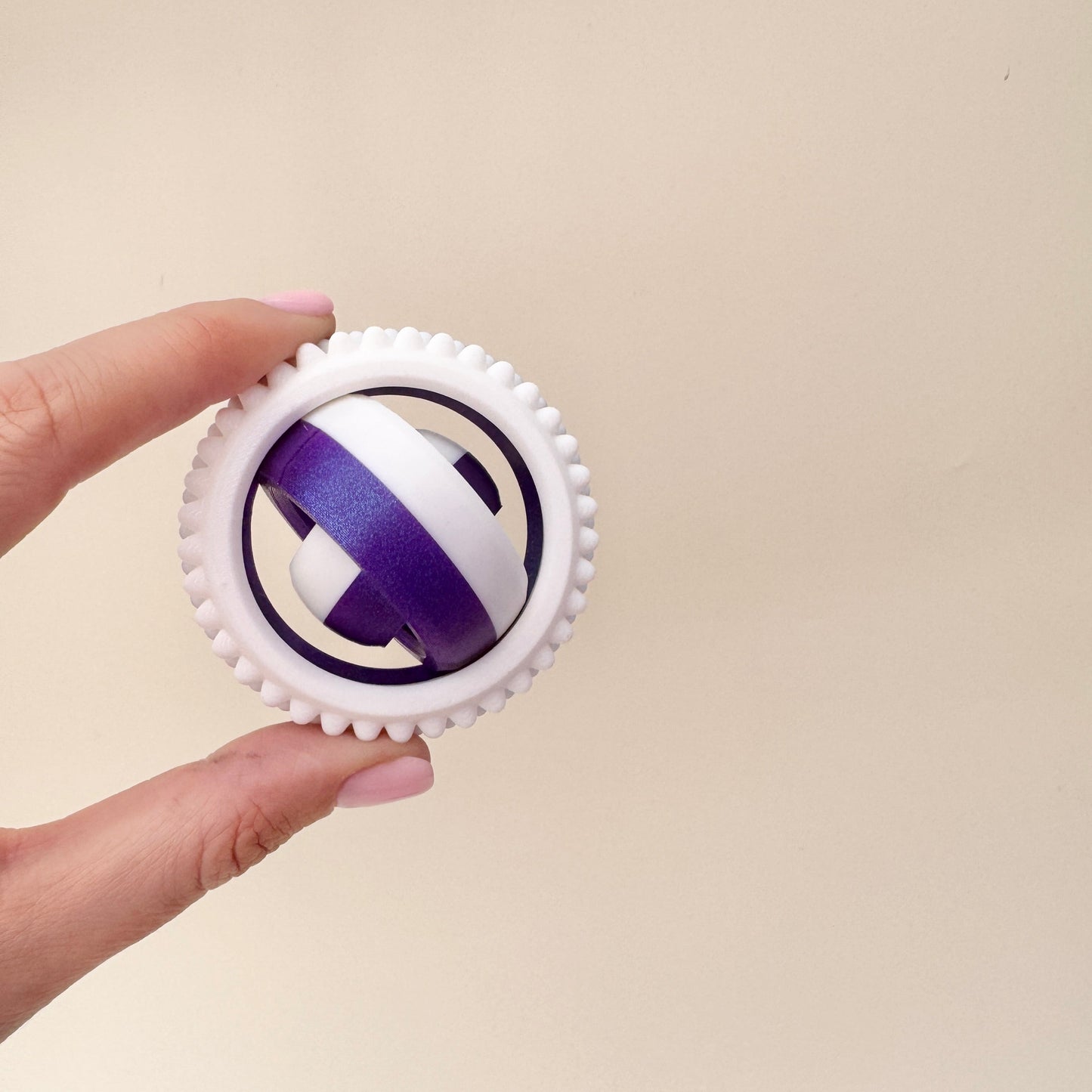 Handheld sensory spinner for focus and regulation.
